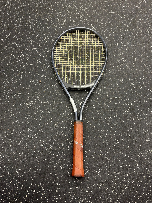 Vist Large View of Product Image Which is Used Wilson ACE HR Adult Tennis Racquet Black 4 3/8"