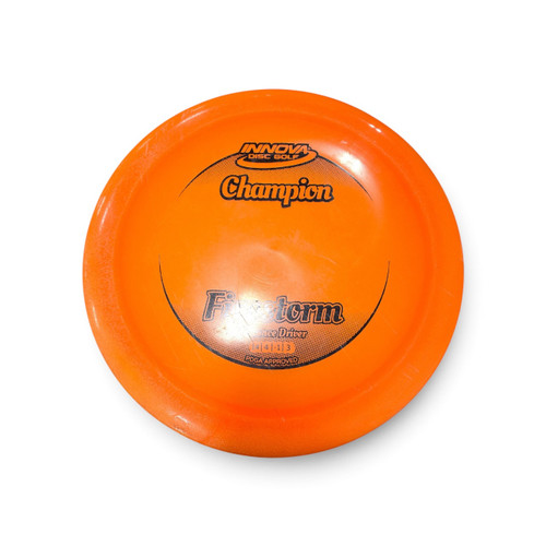 Vist Large View of Product Image Which is Used Innova CHAMPION FIRESTORM Disc Golf Driver Orange