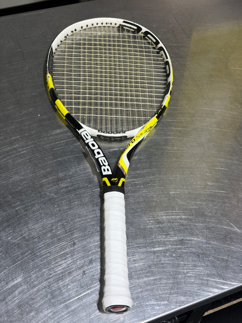 Vist Large View of Product Image Which is Used Babolat AERO PRO DRIVE Adult Tennis Racquet Yellow 4 1/4"