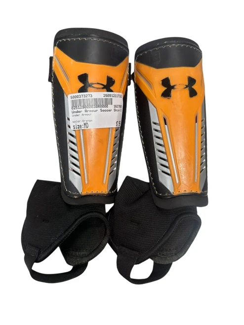 Vist Large View of Product Image Which is Used Under Armour Soccer Shin Guards Junior Orange MD