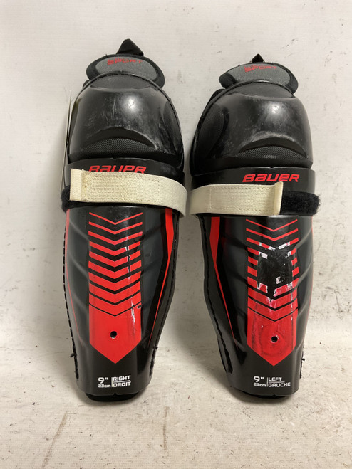 Vist Large View of Product Image Which is Used Bauer LIL SPORT Youth Shin Guards Black And Red 9"