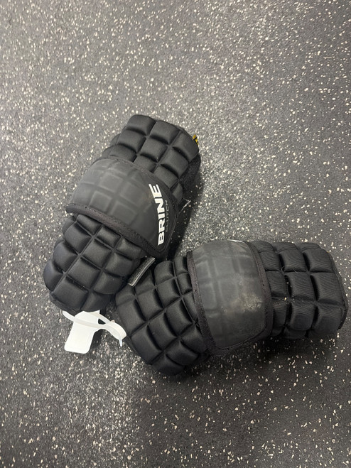 Vist Large View of Product Image Which is Used Brine CLUTCH ARM PADS Lacrosse Arm Pads/Guards Black MD
