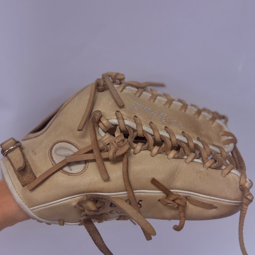 Vist Large View of Product Image Which is Used Rawlings HEART OF THE HIDE TRAP-EZE PROMT27CC BB/SB Glove RH Throw Black And Tan 12 3/4"