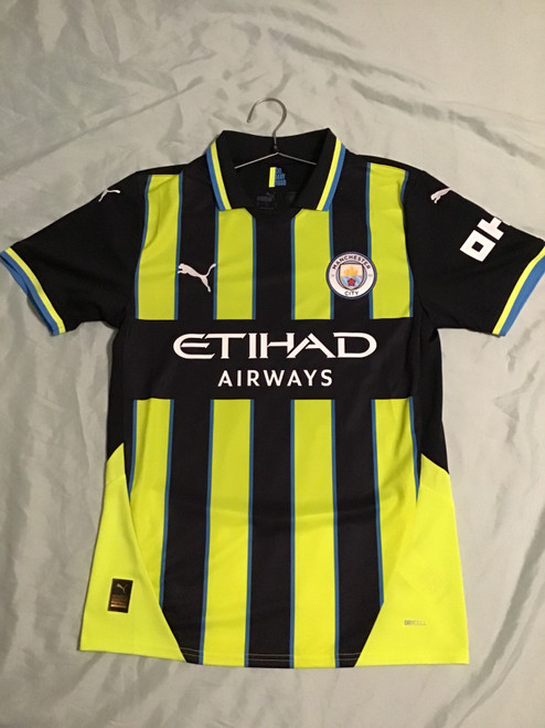 Vist Large View of Product Image Which is NEW Puma MAN CITY JERSEY Soccer Top Adt Navy Blue And Yellow SM