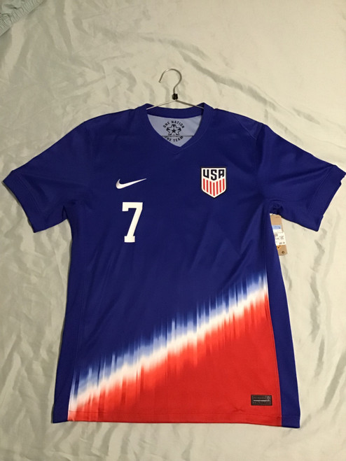 Vist Large View of Product Image Which is NEW Nike USA REYNA JERSEY Soccer Top Adt Royal Blue And Red MD