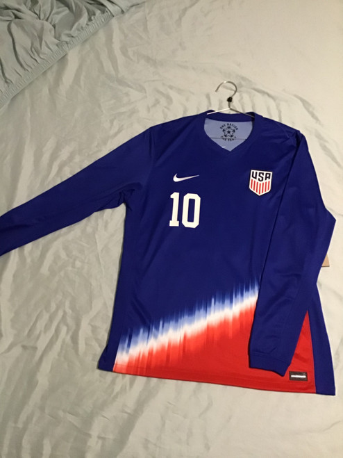 Vist Large View of Product Image Which is NEW Nike USA PULISIC LONGSLEEVE JERSEY Soccer Top Adt Royal Blue And Red LG