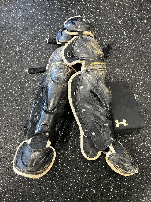 Vist Large View of Product Image Which is Used Under Armour UALG2-SRVS Catchers Leg Guards Black Adult