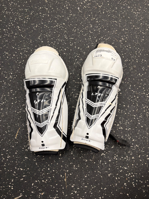 Vist Large View of Product Image Which is Used CCM LTP Youth Shin Guards White 8"