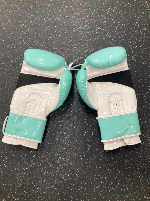 Vist Large View of Product Image Which is Used Triumph UNITED Boxing Gloves Teal Senior