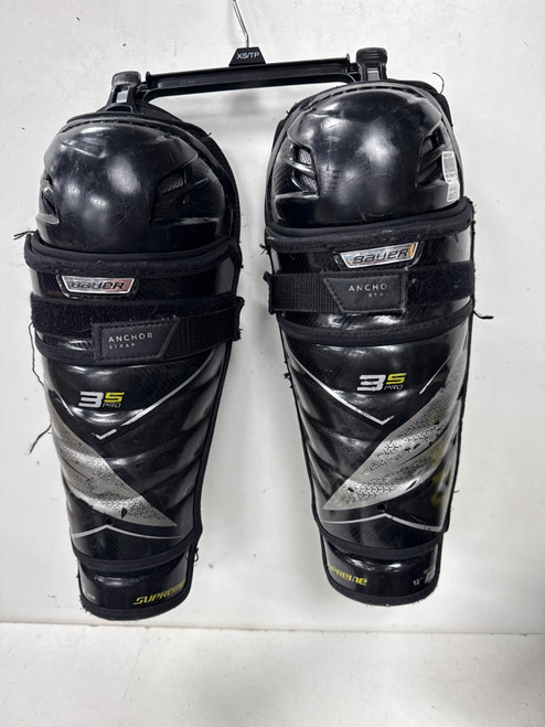 Vist Large View of Product Image Which is Used Bauer SUPREME 3S PRO Intermediate Shin Guards Black 12"