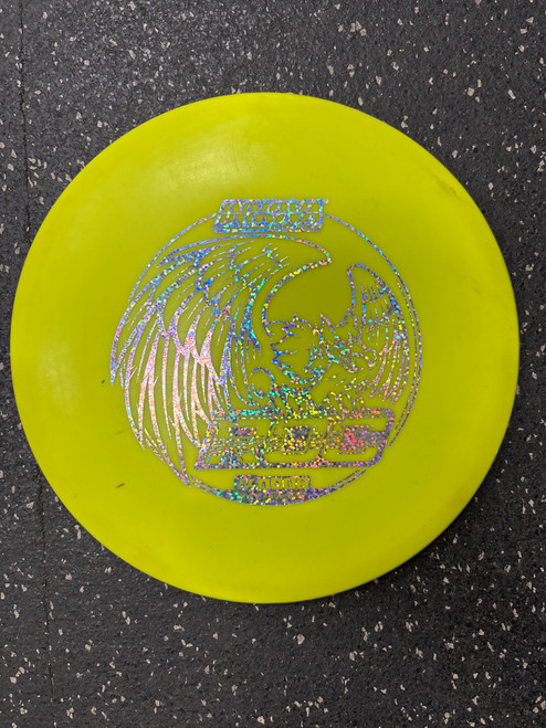 Vist Large View of Product Image Which is Used Innova DX ROC Disc Golf Mid Range Yellow