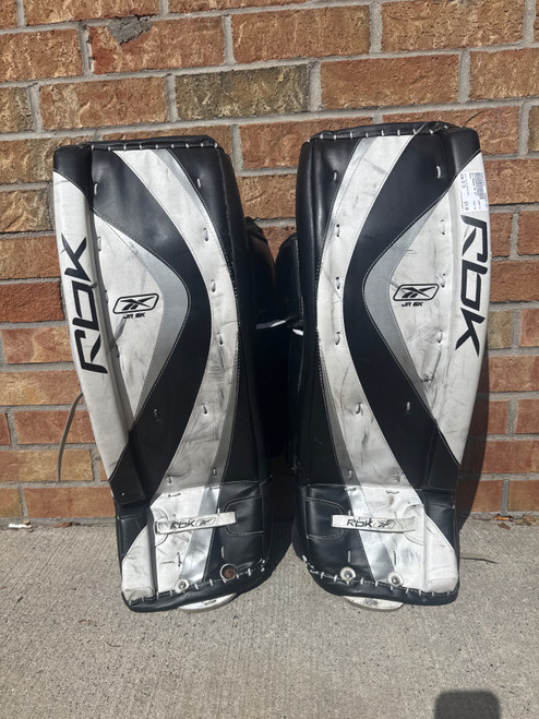 Vist Large View of Product Image Which is Used Reebok 6K Goalie Leg Pads Junior White And Black 29"