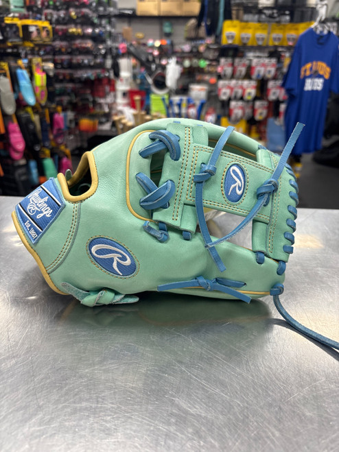 Vist Large View of Product Image Which is Used Rawlings PROR2175-2M Heart of the Hide Glove RH Throw Green 11 3/4"