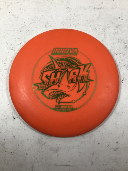 Vist Large View of Product Image Which is Used Innova DX SHARK Disc Golf Mid Range Orange