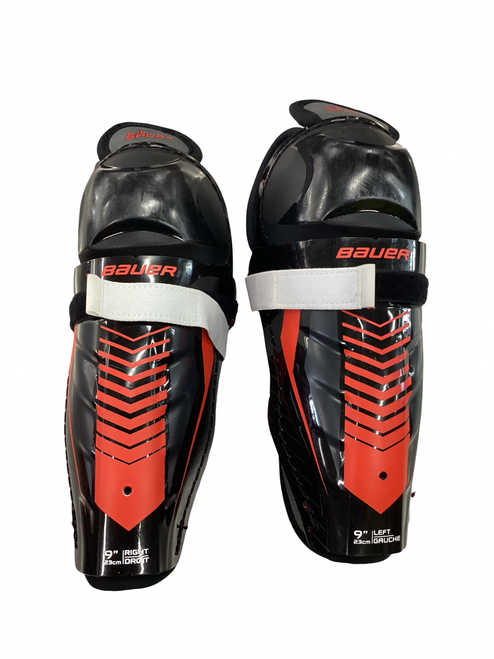 Vist Large View of Product Image Which is Used Bauer LIL SPORT Youth Shin Guards Black 9"
