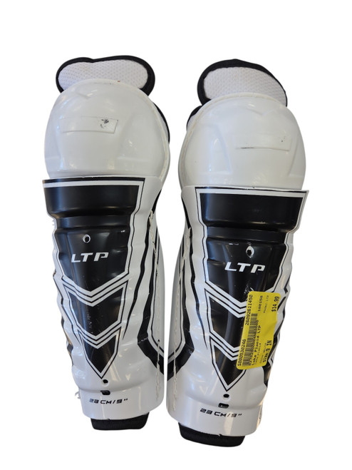 Vist Large View of Product Image Which is Used CCM LTP Junior Shin Guards White 9"