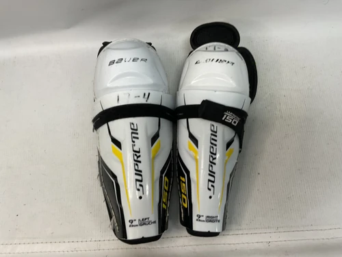 Vist Large View of Product Image Which is Used Bauer SUPREME Youth Shin Guards White 9"