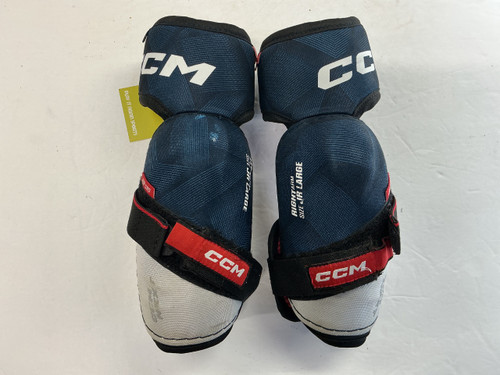 Vist Large View of Product Image Which is Used CCM NEXT Junior Elbow Pads Navy Blue LG