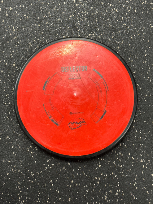 Vist Large View of Product Image Which is Used MVP NEUTRON DEFLECTOR Disc Golf Mid Range Red