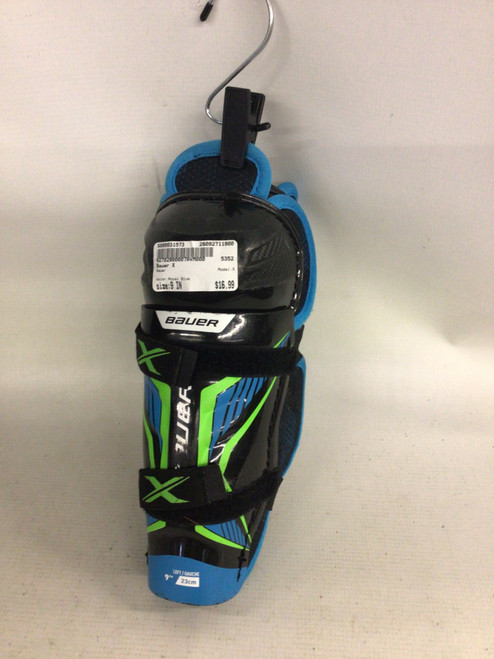 Vist Large View of Product Image Which is Used Bauer X Junior Shin Guards Royal Blue 9"