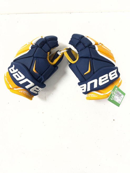Vist Large View of Product Image Which is Used Bauer VAPOR X100 Junior Gloves Navy Blue 11"