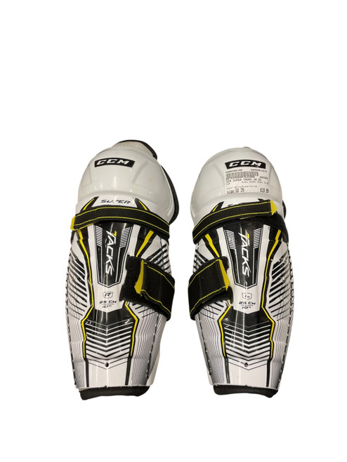 Vist Large View of Product Image Which is Used CCM SUPER TACKS 10 SG Youth Shin Guards White/Black/Yellow 10"