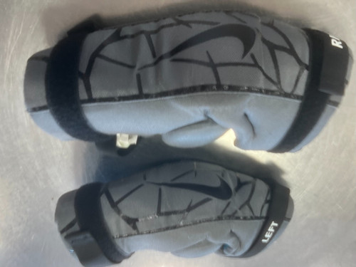 Vist Large View of Product Image Which is Used Nike ARM GUARDS Lacrosse Arm Pads/Guards Grey LG
