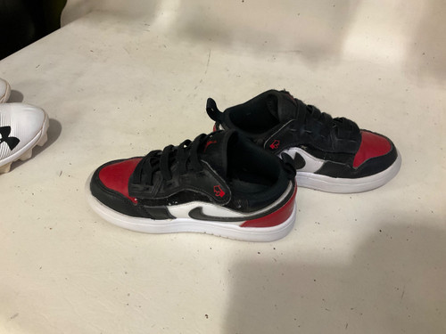 Vist Large View of Product Image Which is Used Nike Basketball Shoes Y Black And Red Youth 12.0
