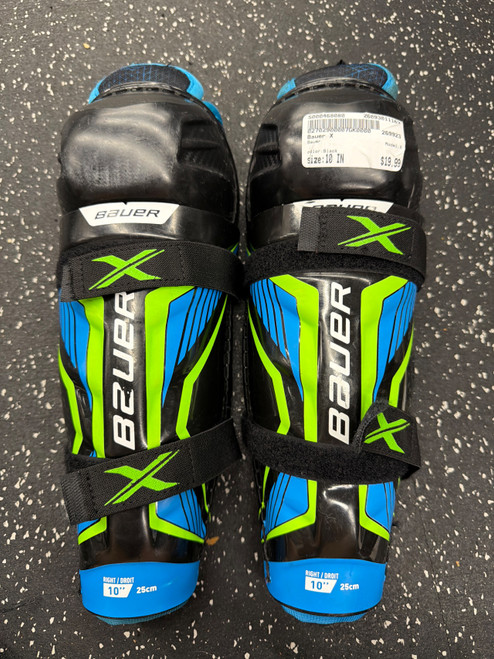 Vist Large View of Product Image Which is Used Bauer X Junior Shin Guards Black 10"