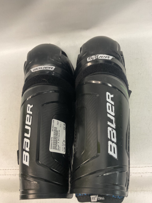 Vist Large View of Product Image Which is Used Bauer X Junior Shin Guards Black 11"