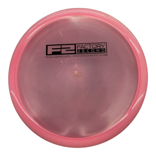 Vist Large View of Product Image Which is Used Innova CHAMPION F2 ROC3 Disc Golf Mid Range Pink 180g