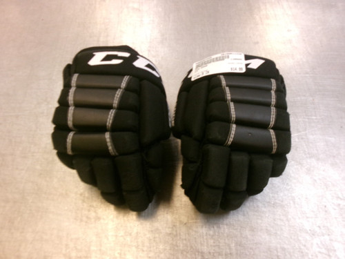 Vist Large View of Product Image Which is Used CCM EDGE Youth Gloves Black 9"