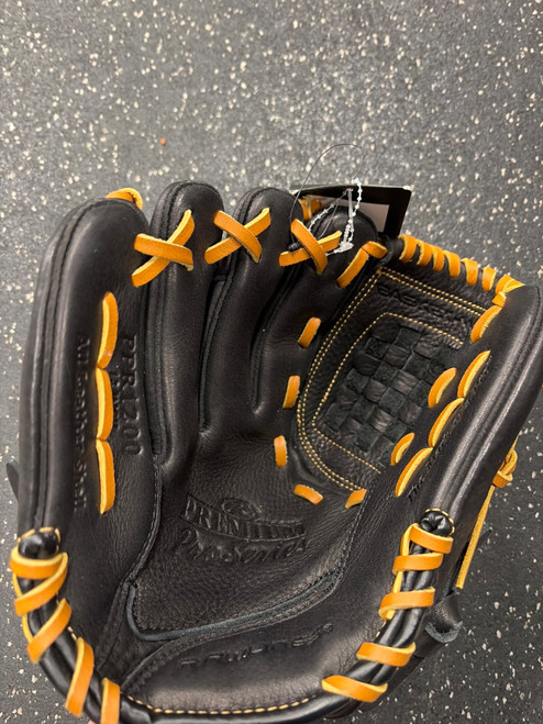 Vist Large View of Product Image Which is Used Rawlings NWT PREMIUM PRO SERIES PPR1200 BB/SB Glove LH Throw Black 12"
