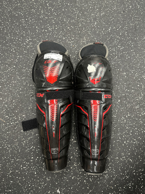 Vist Large View of Product Image Which is Used CCM QLT 230 Junior Shin Guards Black 12"