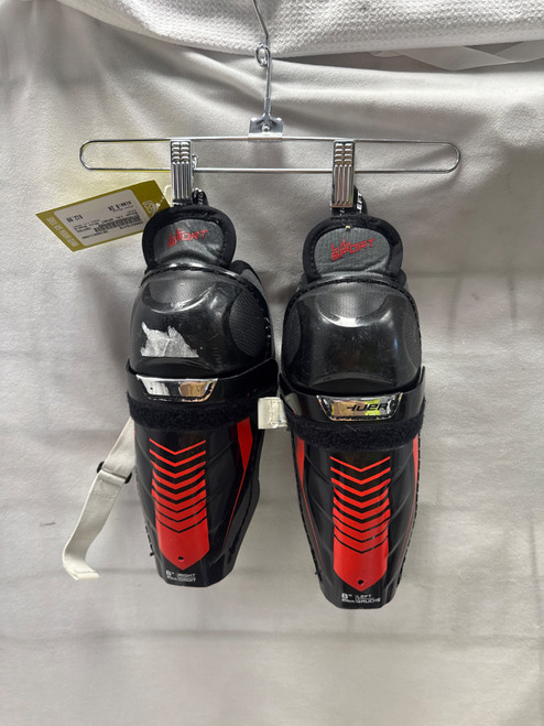 Vist Large View of Product Image Which is Used Bauer LIL SPORT Junior Shin Guards Black 8"