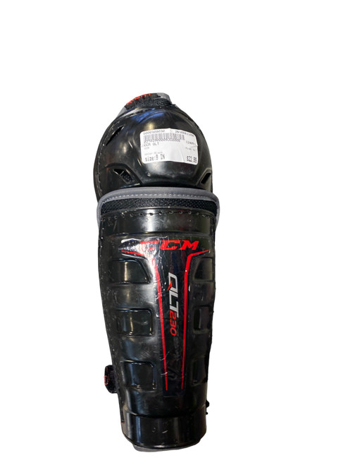 Vist Large View of Product Image Which is Used CCM QLT Junior Shin Guards Black 9"