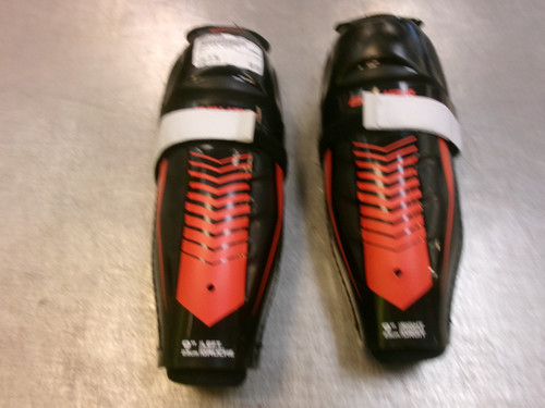 Vist Large View of Product Image Which is Used Bauer LIL SPORT Youth Shin Guards Black 9"