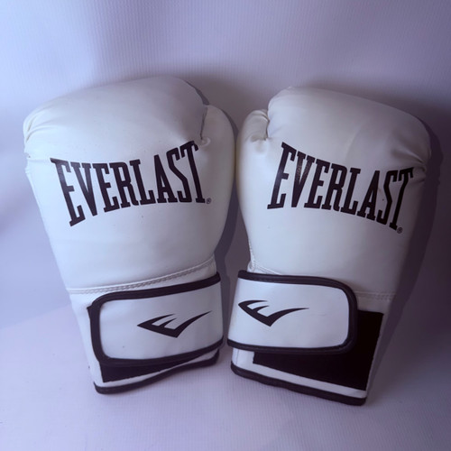 Vist Large View of Product Image Which is Used Everlast Heavy Bag Gloves White And Black LG