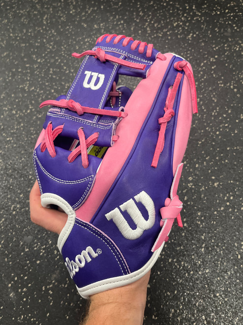 Vist Large View of Product Image Which is Used Wilson A2000 H12 BB/SB Glove RH Throw Pink 12"