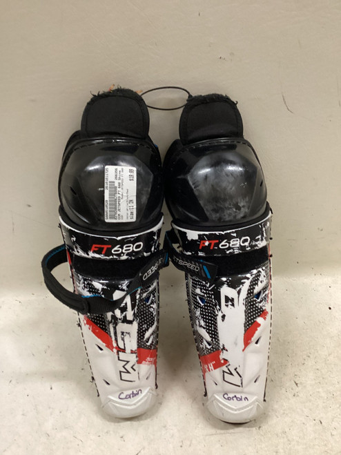 Vist Large View of Product Image Which is Used CCM JETSPEED FT 680 Junior Shin Guards White/Black/Red 11"