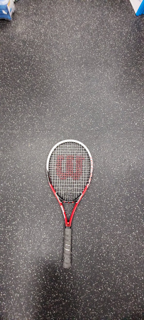 Vist Large View of Product Image Which is Used Wilson IMPACT TITANIUM Adult Tennis Racquet Red 4 3/8"