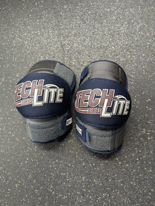 Vist Large View of Product Image Which is Used Itech TECH LITE Junior Elbow Pads LG