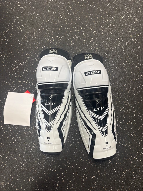 Vist Large View of Product Image Which is Used CCM LTP NWT Youth Shin Guards White 10"