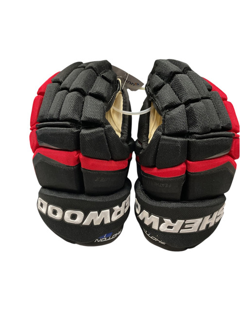 Vist Large View of Product Image Which is Used Sher-wood CODE PROTON 1 14 HG Senior Gloves White/Black/Red 14"