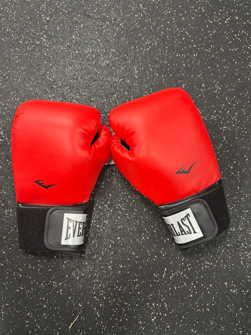 Vist Large View of Product Image Which is Used Everlast Boxing Gloves Red Senior