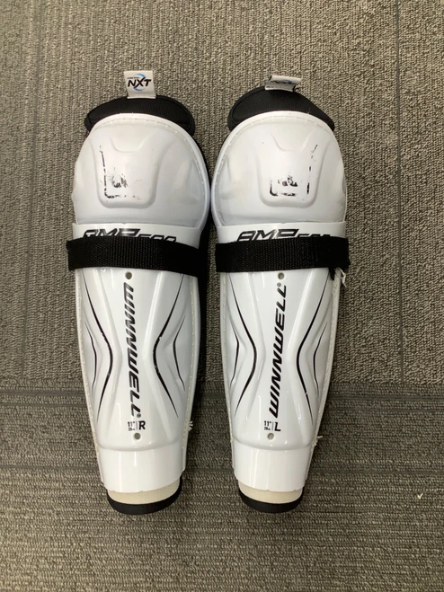 Vist Large View of Product Image Which is Used WinnWell AMP 500 Junior Shin Guards White 11"