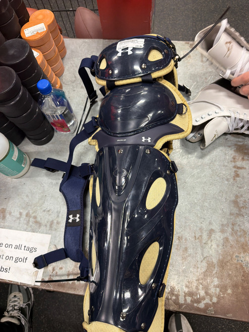 Vist Large View of Product Image Which is Used Under Armour UALG4-AP Catchers Leg Guards Navy Blue Adult