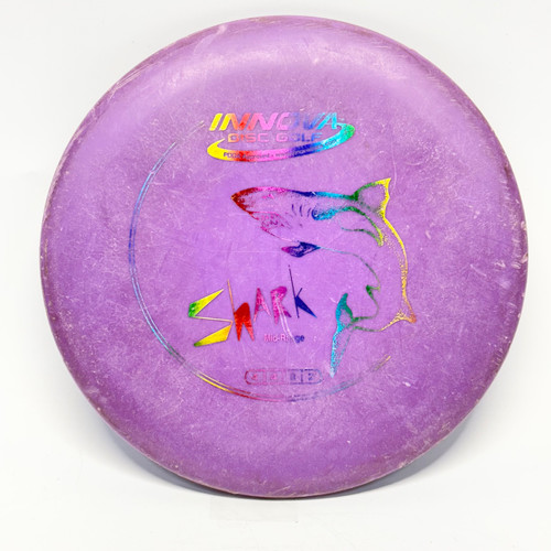 Vist Large View of Product Image Which is Used Innova DX SHARK Disc Golf Mid Range Purple 172g