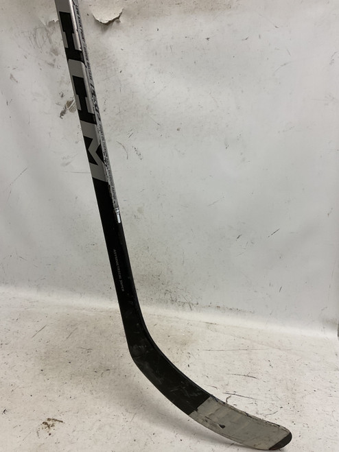 Vist Large View of Product Image Which is Used CCM RIBCORE TRIGGER 8 Senior One Pce Right Grip Black And Purple 80 Flex