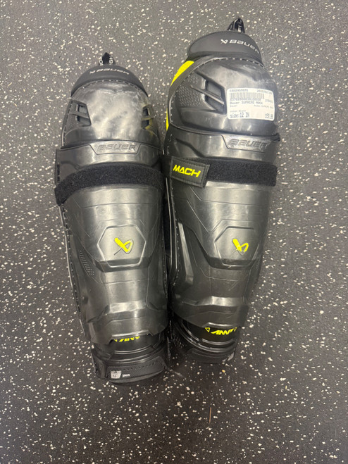 Vist Large View of Product Image Which is Used Bauer SUPREME MACH Intermediate Shin Guards Black 12"